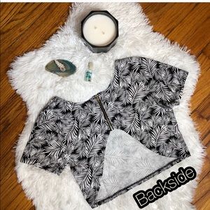 A tropical zip up crop shirt